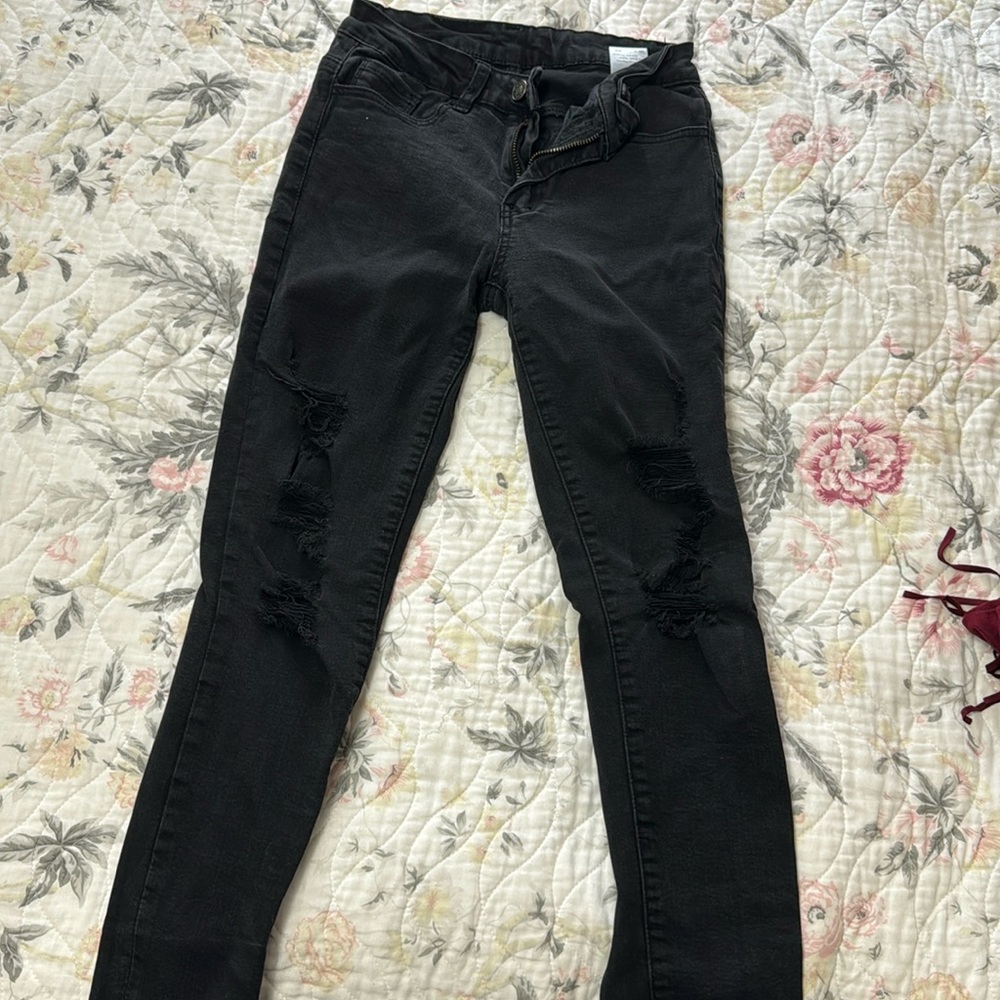Distressed black skinny  jeans